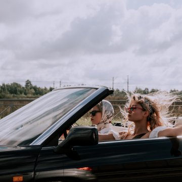 people driving a car